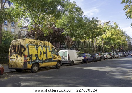 Paris, France - October 31: Street art graffiti on an a car in the city, October 31, 2014 in Paris, France