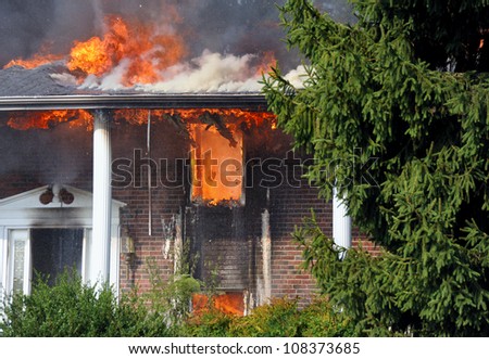 residential house burning to the ground