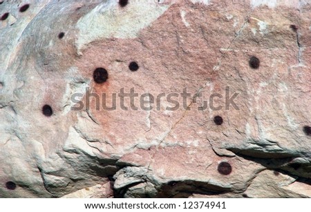 rock with ore or oxide in circular shapes - natural background