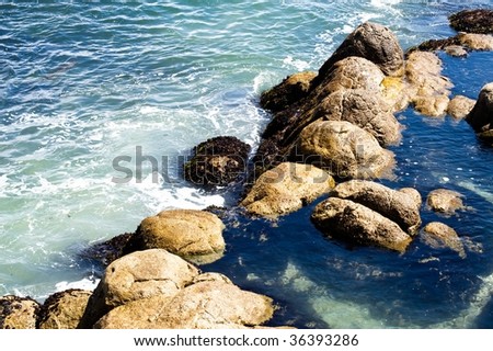 clear water and rocks at Monterrey Bay, California