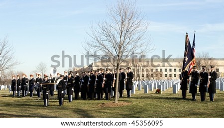WASHINGTON - JANUARY 14: Military band and color guard at full honors funeral at Arlington Cemetery on January 14, 2010 in Arlington, VA.