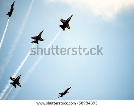 ANDREWS AFB, WASHINGTON DC- MAY 16: US Navy Demonstration Squadron Blue angels, flying on Boeing F/A-18 showing precision of flying in signature starburst maneuver on May 16, 2010 in Washington DC.