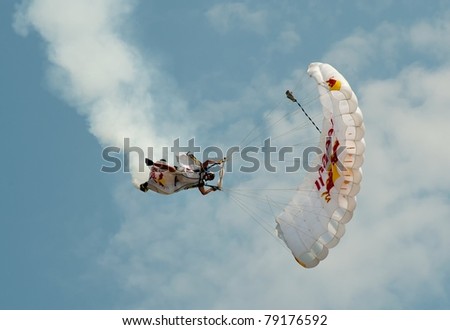 OCEAN CITY, MD - JUNE 11: member of the Red Bull Air Force, skydiver, performs during the annual Ocean City Air Show on June 11, 2011 in Ocean City, Maryland.