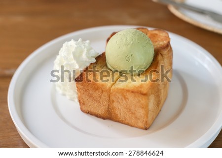 honey toast with green tea ice cream and whipped cream