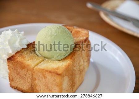honey toast with green tea ice cream and whipped cream