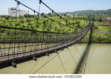 Suspension bridge at wetland park in Taiwan.