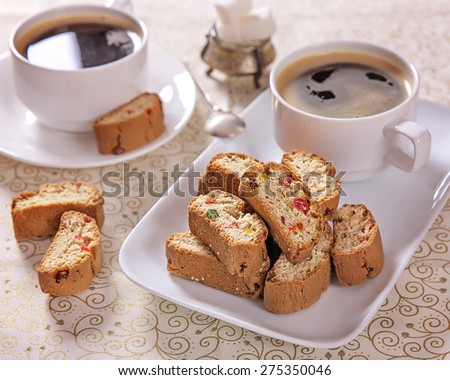 Biscotti -  Italian cookies and  a cups of coffee (selective focus, shallow depth of field)