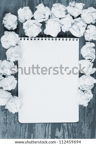 Empty paper, crumpled paper on wooden table