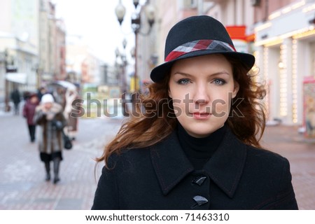 Woman  in winter city street close up