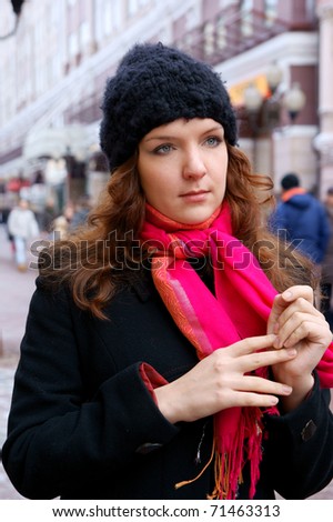 Woman  in winter city street close up