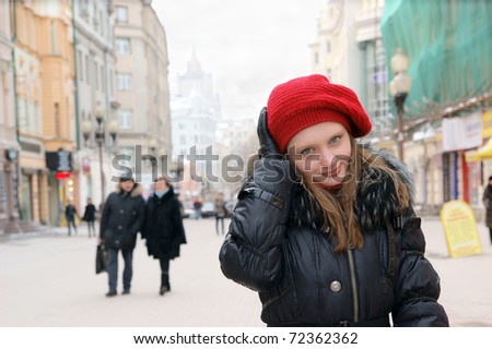 Woman in winter city street