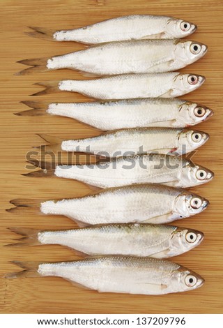 Bleak fish on wooden background