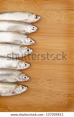 Bleak fish on wooden background