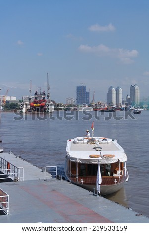 HO CHI MINH, VIETNAM - DECEMBER 22, 2014 : View of Ho Chi Minh city riverside Saigon Port at noon December 22, 2014. Ho Chi Minh city is the biggest city and economic center in Vietnam.
