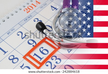 Regular medical examination concept, stethoscope on calendar with usa flag