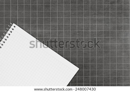 Blank school board with chalk and blank checked note paper for text