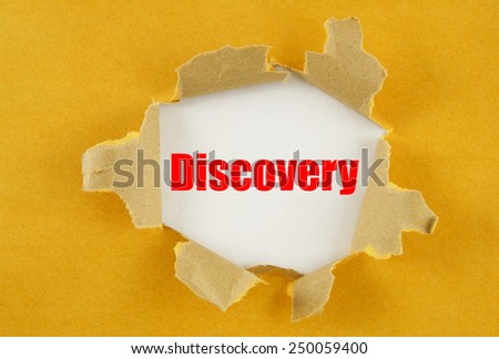 Torn yellow paper with word discovery on white background