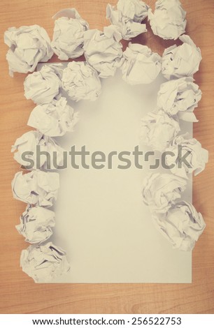 Empty paper, crumpled paper on wooden table