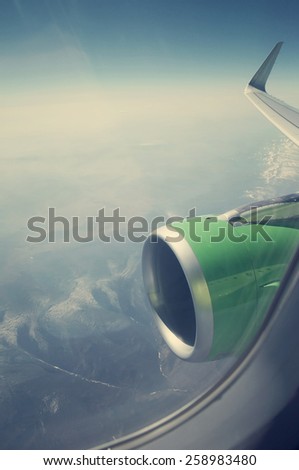View from airplane window with room for text