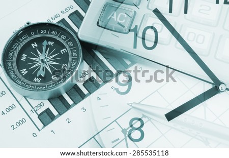 Business concept with calculator, clock and compass on documents