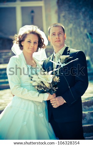 young beautiful wedding couple outdoor-colorized photo for old mood