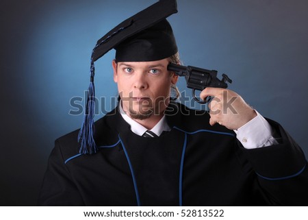 young graduation man with gun