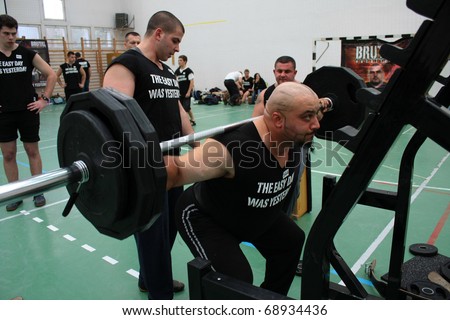 PECS - OCTOBER 16: Unknown man participates in Brutal Challenge power lifting championship October 16, 2010 in Pecs, Hungary.