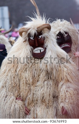MOHACS, HUNGARY - MARCH 6: Unidentified persons in mask at the Mohacsi Busojaras, it is a carnival for spring greetings March 6, 2011 in Mohacs, Hungary.