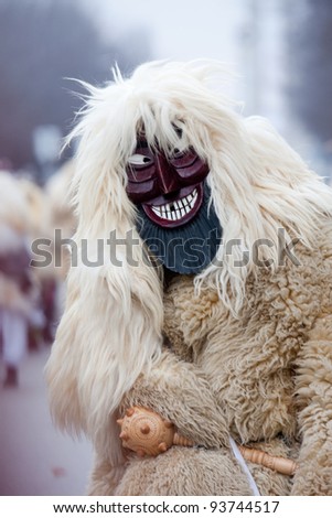 MOHACS, HUNGARY - MARCH 6: Unidentified person in mask participants at the Mohacsi Busojaras, it is a carnival for spring greetings on March 6, 2011 in Mohacs, Hungary.