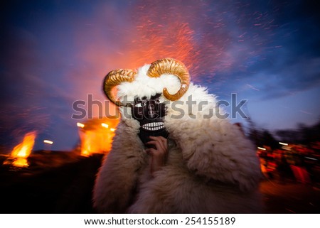 MOHACS, HUNGARY - FEBRUARY 17: Unidentified people in mask participants at the Mohacsi Busojaras, it is a carnival for spring greetings) February 17, 2015 in Mohacs, Hungary.