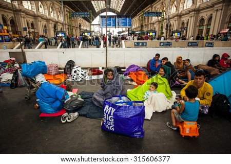 BUDAPEST - SEPTEMBER 4 :Transit zone at the Keleti Railway Station for war refugees on 4 September 2015 in Budapest, Hungary. Refugees are arriving constantly to Hungary on the way to Germany.