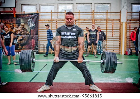 PECS, HUNGARY- OCTOBER 16: Unidentified man participates in Brutal Challenge power lifting championship on October 16, 2010 in Pecs, Hungary.