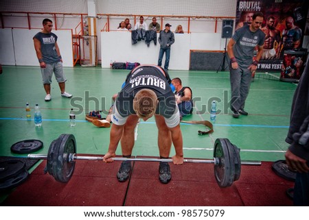 PECS - OCTOBER 16: Unknown man participates in Brutal Challenge power lifting championship October 16, 2010 in Pecs, Hungacry.