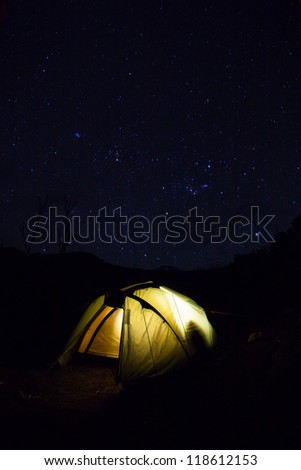 Machame Camp is the first campsite on the Machame Route. An impressive night sky over a tent on a clear night.