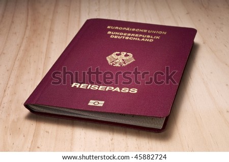 german travel passport with biometric chip symbol on white background