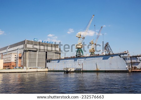SAINT-PETERSBURG, RUSSIA - MAY 23, 2014: Dock of ALMAZ Shipbuilding Company, St.-Petersburg. Company specializes in high-speed ships and boats building