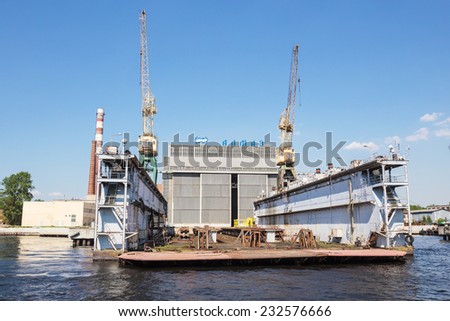 SAINT-PETERSBURG, RUSSIA - MAY 23, 2014: Dock of ALMAZ Shipbuilding Company, St.-Petersburg. Company specializes in high-speed ships and boats building