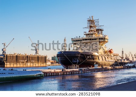 SAINT-PETERSBURG, RUSSIA - MARCH 13, 2014: The diesel-powered icebreaker Moscow on a quay at the Leytenanta Shmidta embankment, St.-Petersburg