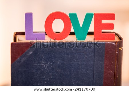 word love made from foam cut on the book
