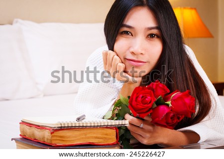woman  in her nightgown on bed