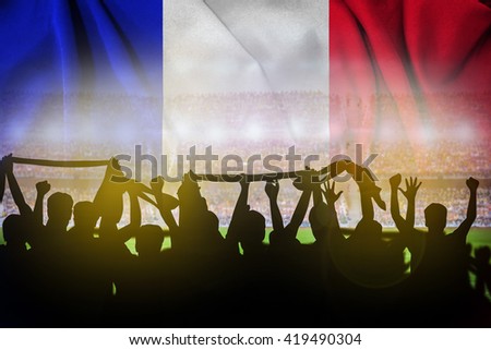 Silhouettes of football supporters in the stadium during match merge with french flag