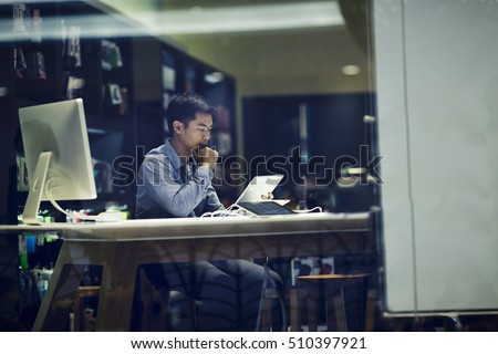 businessman using tablet pc in meeting room