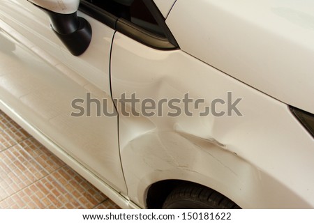 Damaged car after crash accident