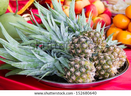 Pineapples in the tray for respect to god chinese style
