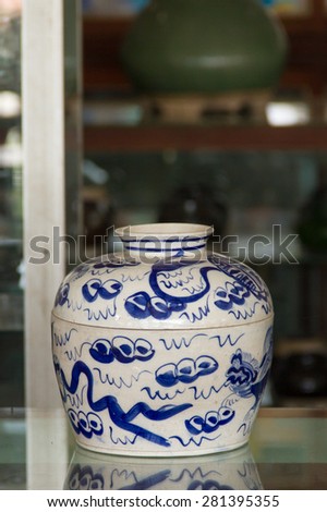 Antique Chinese porcelain green jar at Antique store