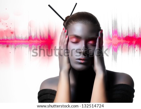 Close up Beautiful Zen Woman in Creative High Fashion Makeup in Sensual Pose with Hands on the Face with Sound Waves Background