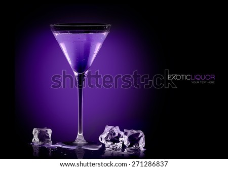 Stemmed cocktail glass with blackberry liquor and ice cubes on the table, close-up on purple and black background. Template design with sample text