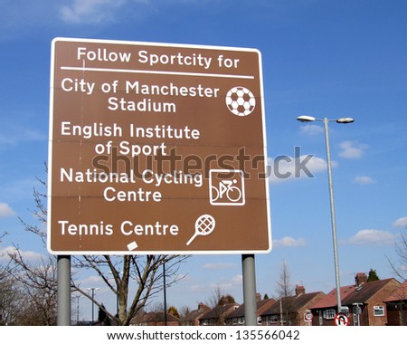 MANCHESTER, ENGLAND, APRIL 6: A road sign listing a number of sporting attractions found in the Sportcity district of Manchester on April 6 2013. Manchester hosted the 2002 Commonwealth Games there.
