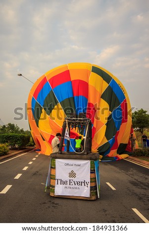 KUALA LUMPUR - MARCH 30: Balloon of South Korea landed at the middle of the road during 5th Putrajaya International Hot Air Balloon on March 30, 2013
