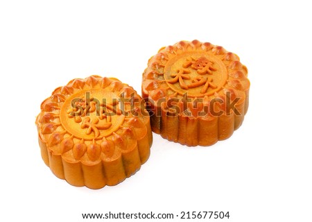 Mid-Autumn Festival moon cakes on white background. (The chinese words indicates the type of mooncake, not the brand)